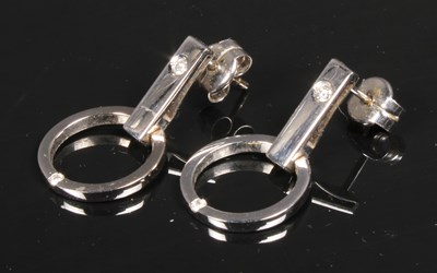 Lot 26 - A pair of 18 carat white gold and diamond...