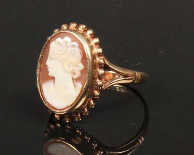 Lot 48 - A 9 carat carved cameo portrait ring, size K/L,...