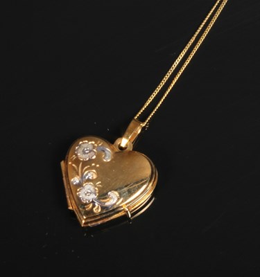 Lot 46 - A 9 carat yellow gold heart shaped locket...