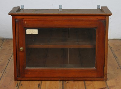 Lot 487 - A mahogany chemist's drug cabinet, having a...