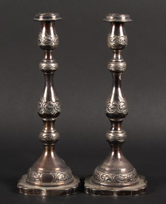 Lot 16 - A pair of silver table candlesticks, London...