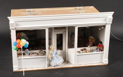 Lot 565 - A vintage doll's house/shop/school diorama,...