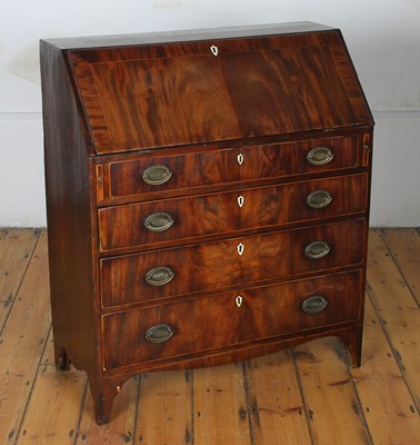Lot 449 - A Regency mahogany bureau, with ivory...
