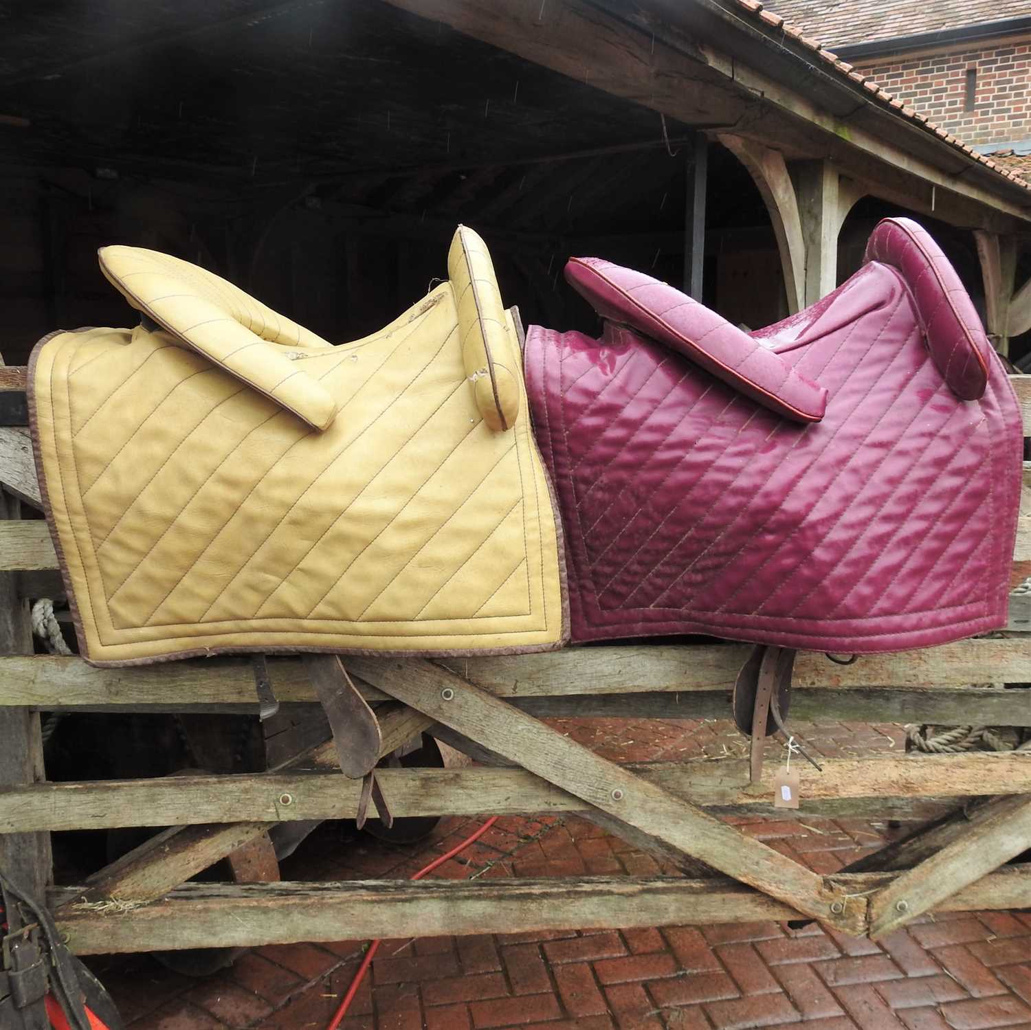 Lot 402 - Two 16th century replica horse saddles