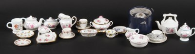 Lot 136 - A collection of miniature floral porcelain...