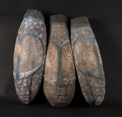 Lot 771 - Three Tongan polychrome decorated masks. h.49cm