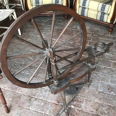 Lot 28 - A 19th century wooden spinning wheel