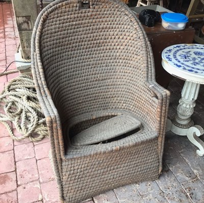 Lot 37 - A 19th century woven commode chair