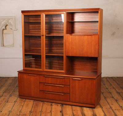 Lot 405 - A mid century teak sideboard/display cabinet,...