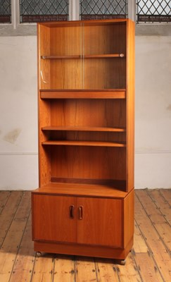 Lot 488 - A G-Plan teak bookcase/display cabinet, with...