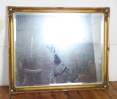 Lot 733 - A large gilt framed wall mirror