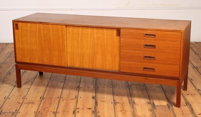 Lot 395 - A mid century teak sideboard, 71x68x51