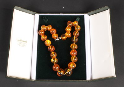 Lot 89 - A large silver and amber necklace. 85g