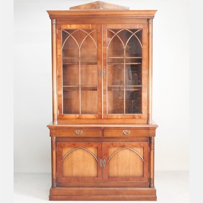 Lot 279 - A reproduction cherrywood cabinet bookcase,...