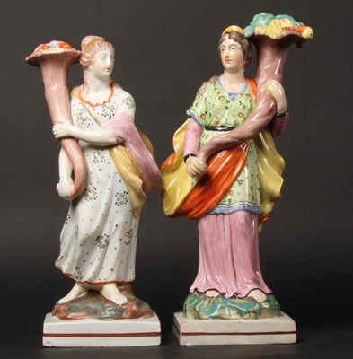Lot 127 - A pair of Staffordshire figures depicting...