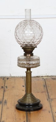 Lot 780 - A large Victorian brass oil lamp, having a...