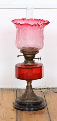 Lot 772 - A brass oil lamp, by Veritas Lampworks, with...