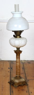 Lot 619 - A Victorian oil lamp, having an alabaster...