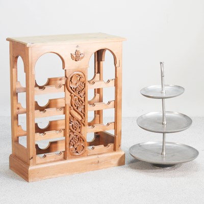 Lot 198 - A modern carved pine wine rack, together with...