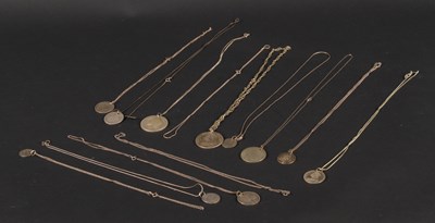Lot 38 - A collection of coin jewellery, including a...