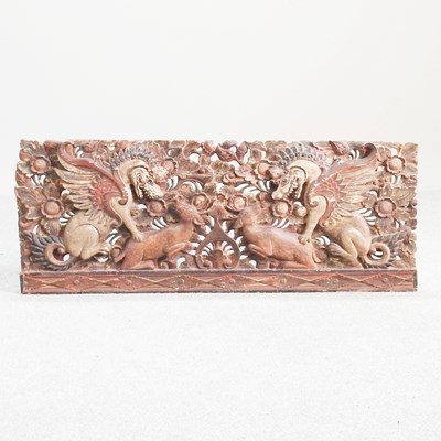 Lot 108 - An antique Eastern carved and painted panel,...