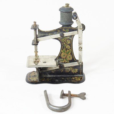 Lot 120 - A 19th century Muller style toy sewing machine,...