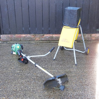 Lot 282 - A Qualcast petrol strimmer, together with an...