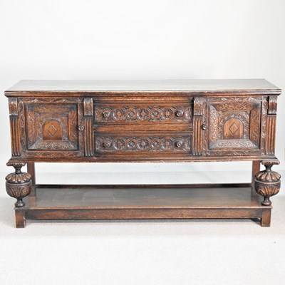 Lot 139 - A large Jacobean style oak dresser base, early...