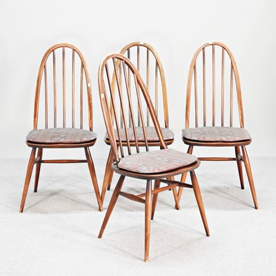 Lot 134 - A set of four 1970's Ercol dark elm spindle...
