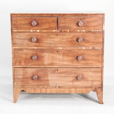 Lot 474 - A 19th century mahogany chest, on swept...