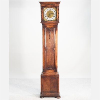 Lot 269 - A 1920s oak cased longcase clock, the dial...