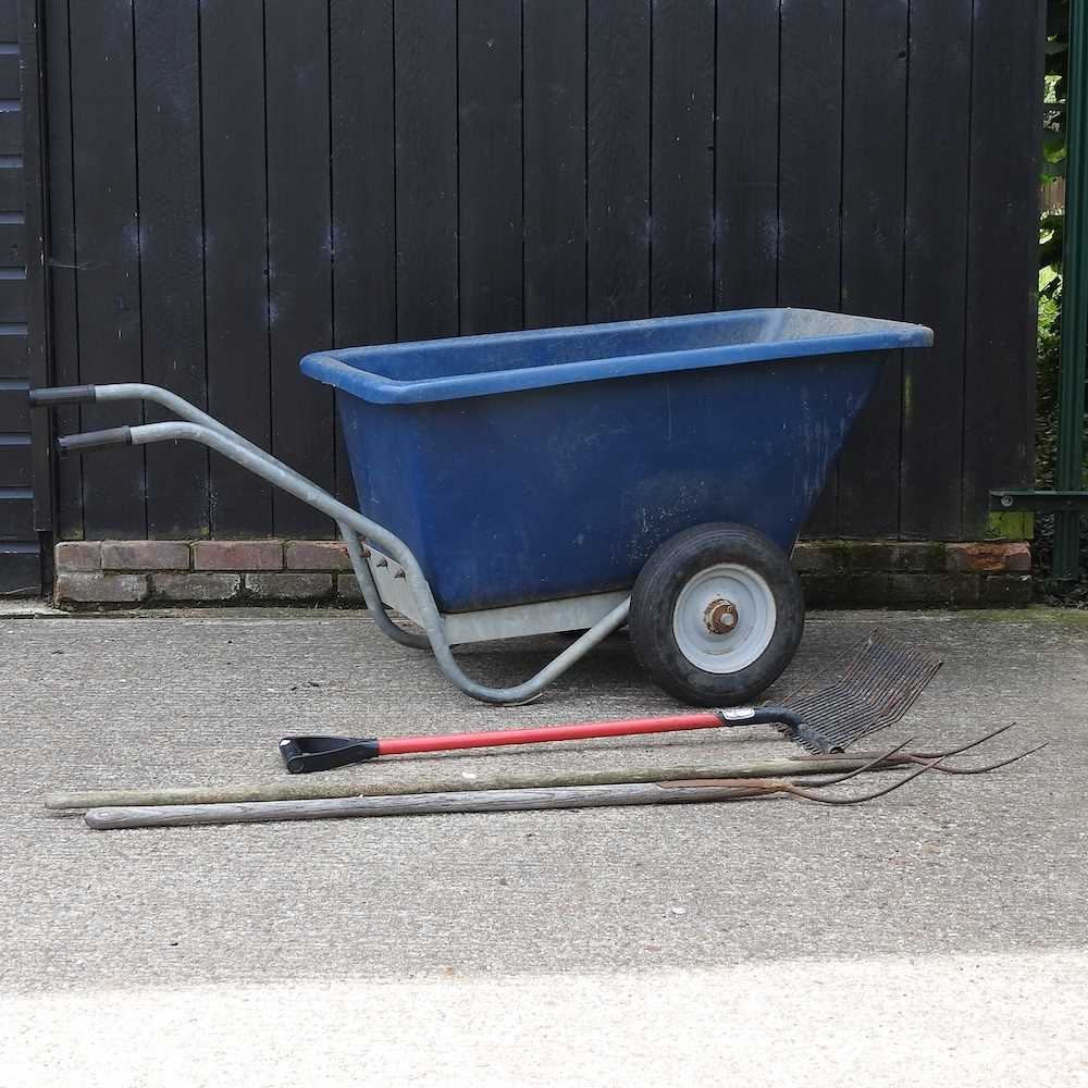 Lot 337 A large blue plastic wheelbarrow