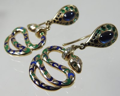 Lot 45 - A pair of 14 carat gold diamond and enamelled snake earrings