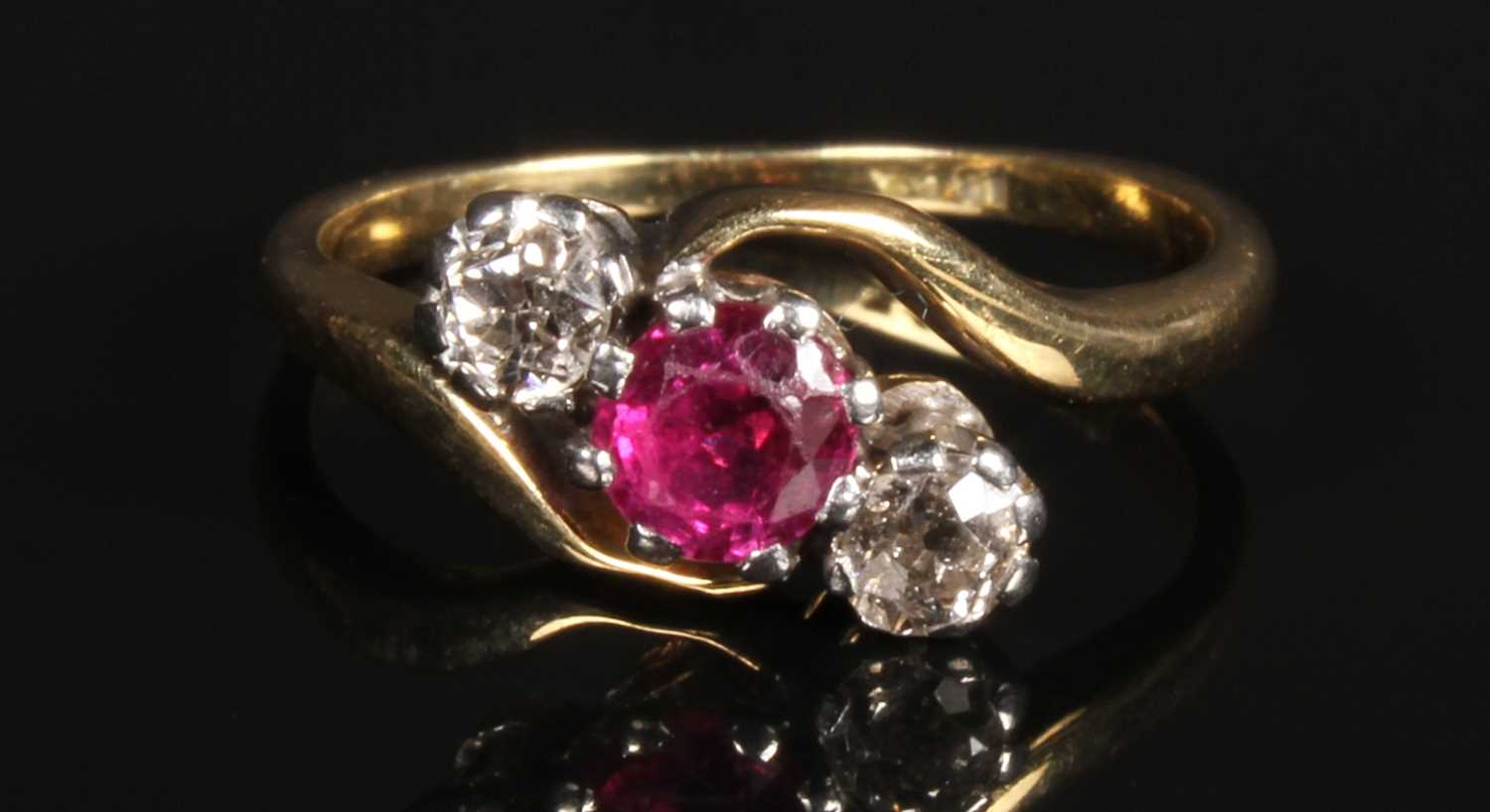 Lot 57 - An 18 carat yellow gold ruby and diamond