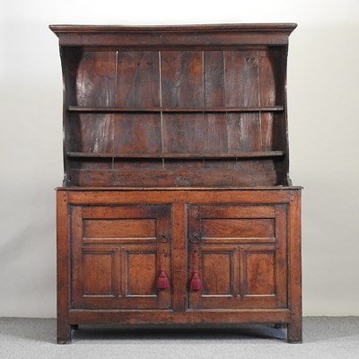 Lot 700 - An 18th century oak dresser