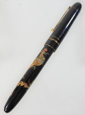 Lot 53 - A Namiki gilt and black lacquered fountain pen