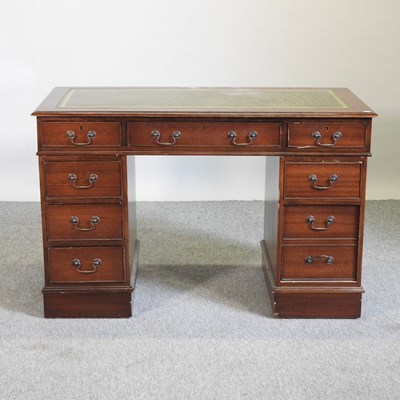 Lot 705 - A reproduction mahogany pedestal desk