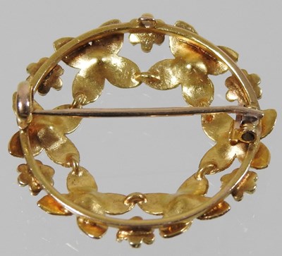Lot 46 - A 15 carat gold moonstone brooch