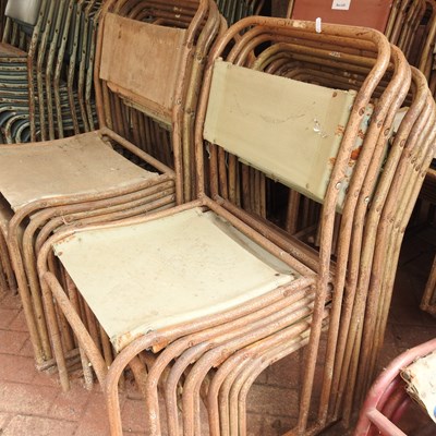 Lot 76 - A set of twenty stacking metal framed chairs