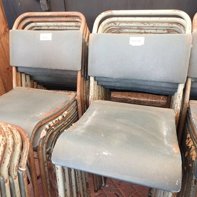 Lot 79 - A set of twenty stacking metal chairs