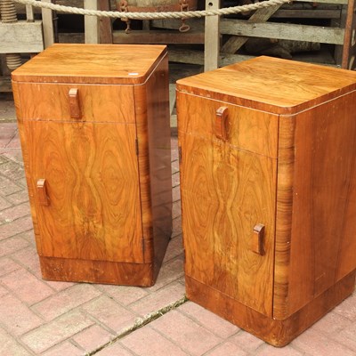 Lot 85 - A pair of Art Deco walnut bedside cabinets