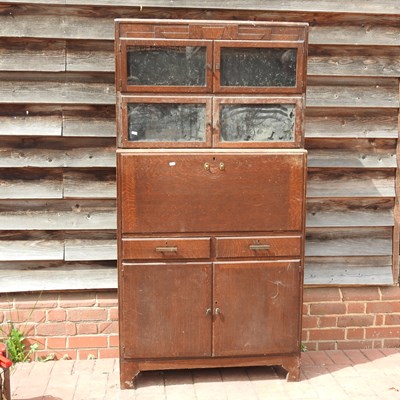 Lot 88 - A mid 20th century oak Minty bureau cabinet