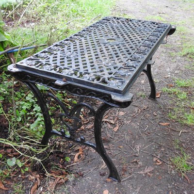 Lot 89 - A metal garden table