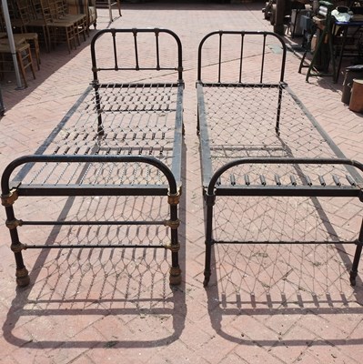 Lot 72 - Two early 20th century iron single bedsteads