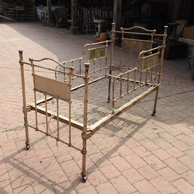 Lot 83 - An early 20th century painted iron children's cot