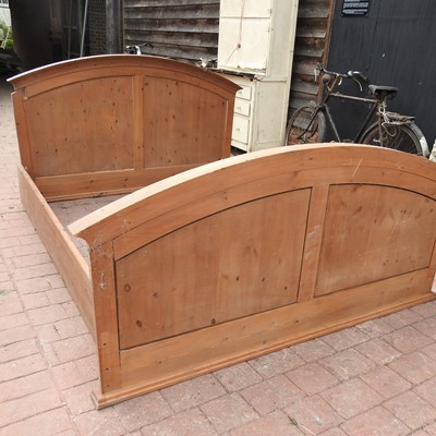 Lot 23 - A pine double bedstead