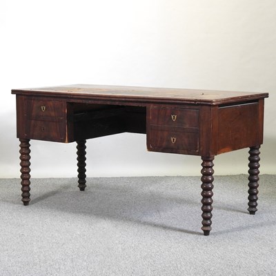 Lot 717 - A 19th century mahogany desk