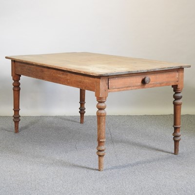 Lot 447 - An antique pine kitchen table