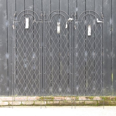 Lot 347 - A set of three metal garden trellis