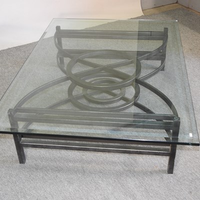 Lot 733 - A glass top coffee table